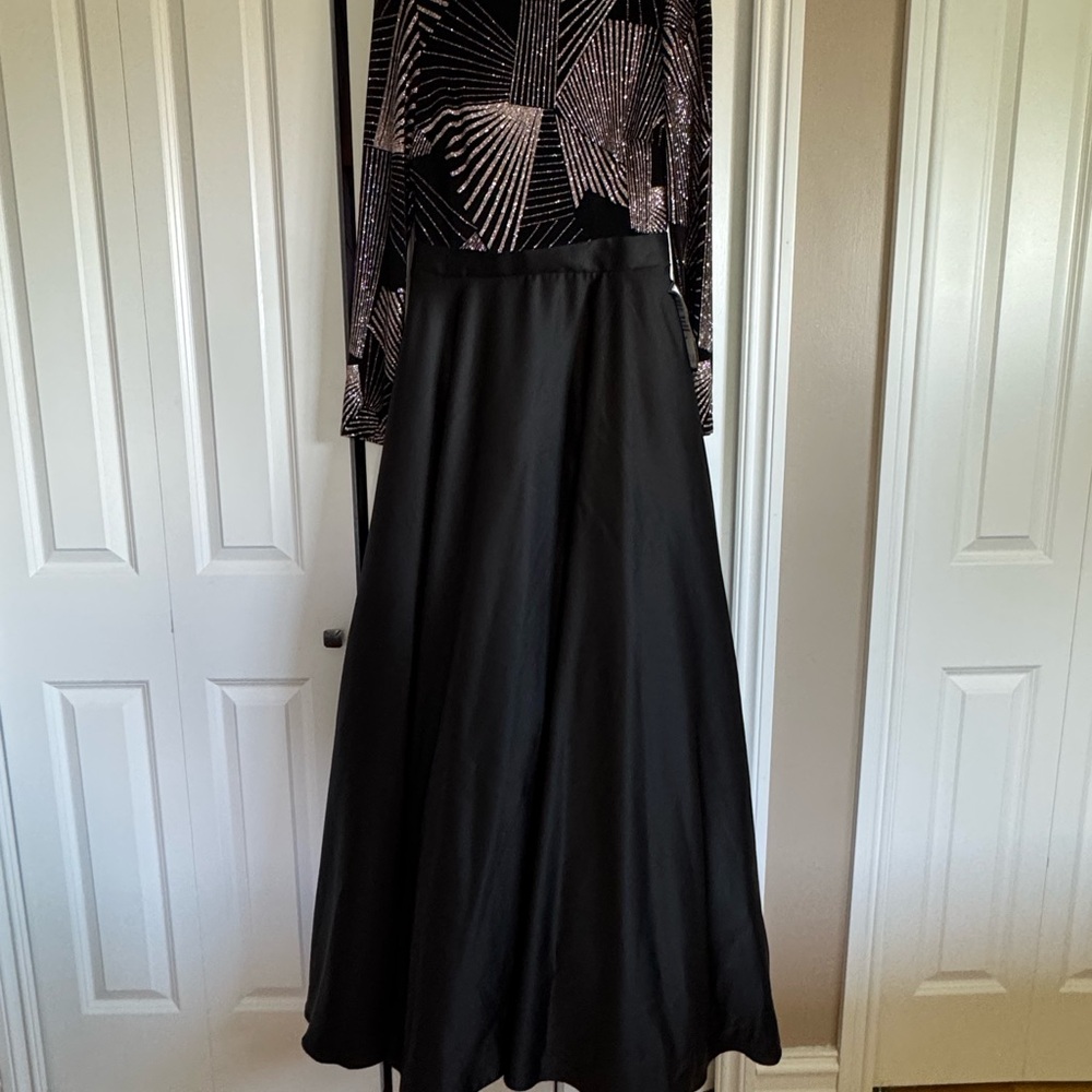 Betsy & Adam ,Black and gold color dress from Macys size 10